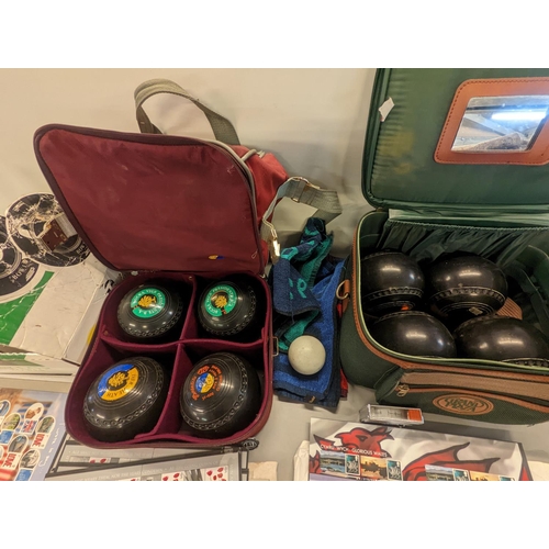 389 - A mixed lot to include British commemorative stamps and three cased lawn bowls, Location: ROS