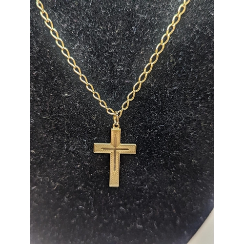 407 - A 9ct gold pendant in the form of a cross, on a 9ct gold chain link necklace, 10.4g
Location: CAB5