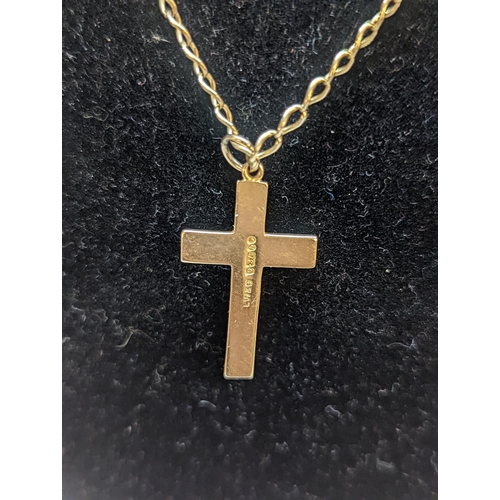 407 - A 9ct gold pendant in the form of a cross, on a 9ct gold chain link necklace, 10.4g
Location: CAB5