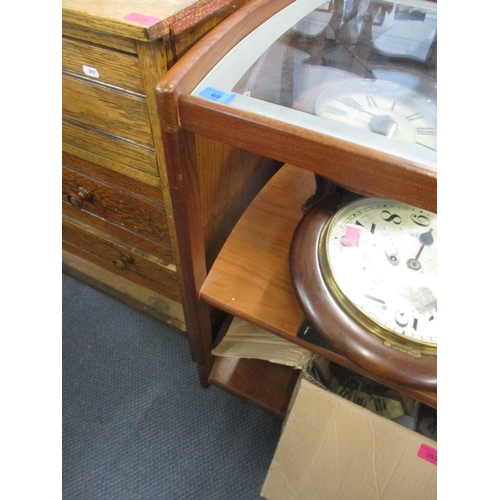 69 - A mid-century retro teak three tier tea trolley, inset glass top with frosted edge, over two under t... 