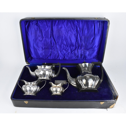 179 - A boxed Edwardian four piece silver tea/coffee set by Marks & Cohen, Birmingham 1907, comprising a t... 