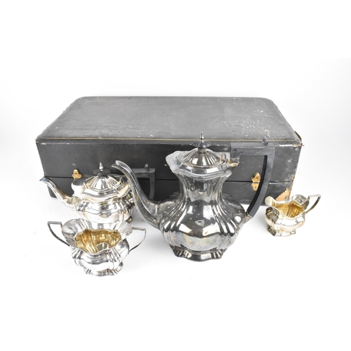 179 - A boxed Edwardian four piece silver tea/coffee set by Marks & Cohen, Birmingham 1907, comprising a t... 