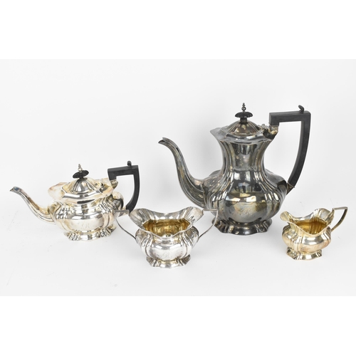 179 - A boxed Edwardian four piece silver tea/coffee set by Marks & Cohen, Birmingham 1907, comprising a t... 