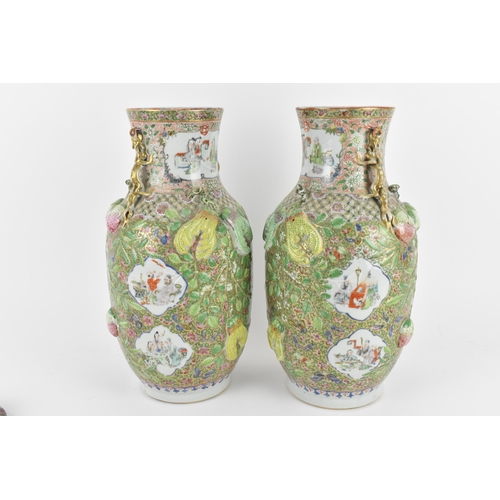 220 - A pair of Chinese Canton Qing dynasty porcelain lidded vases, 19th century, of baluster form, each w... 