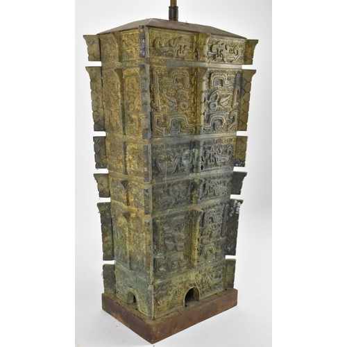 223 - A Chinese heavy bronze lamp in the archaic design, of tapered rectangular form, on a wooden base, wi... 