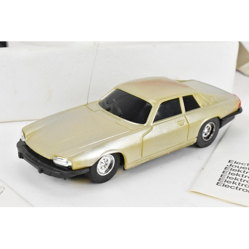 251 - Corgi Toys - a 1981 Corgi Jaguar x JS, A/F, M5750, boxed radio controlled car, complete with control... 