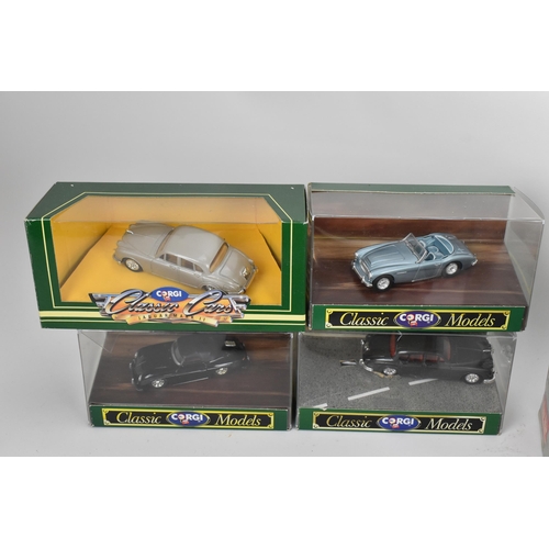 254 - A group of boxed model cars to include a large 1:18 scale European collectables American Airlines Lo... 