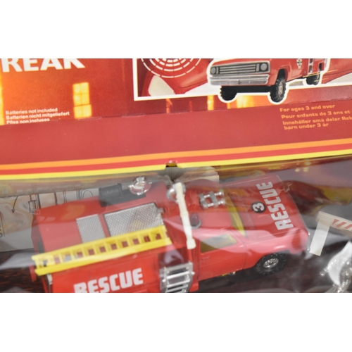 255 - A 1982 Hot Wheels boxed 'Play Settings' Firefighting scene, a Corgi 1001 HCB-Angus Firestreak, along... 