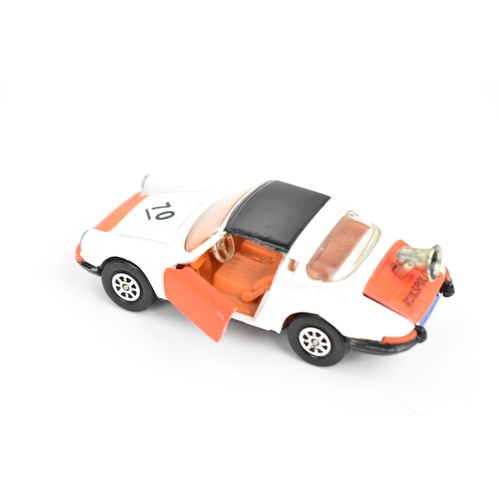 260 - Corgi Toys - a group of four Corgi model vehicles to include 'R'JKSPOLITIE' Porsche Targa 9115, Chev... 