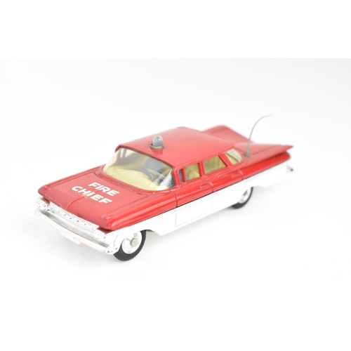 260 - Corgi Toys - a group of four Corgi model vehicles to include 'R'JKSPOLITIE' Porsche Targa 9115, Chev... 