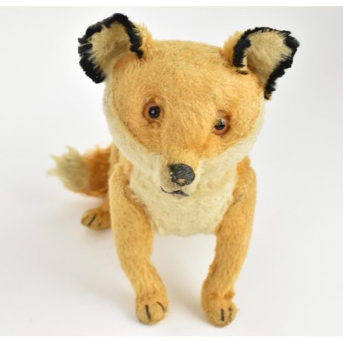 264 - A vintage Steiff style fox soft toy, approx 38cm long tail to nose
Location: