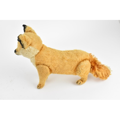 264 - A vintage Steiff style fox soft toy, approx 38cm long tail to nose
Location: