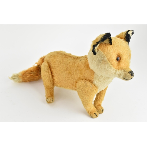 264 - A vintage Steiff style fox soft toy, approx 38cm long tail to nose
Location: