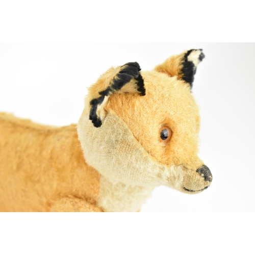 264 - A vintage Steiff style fox soft toy, approx 38cm long tail to nose
Location: