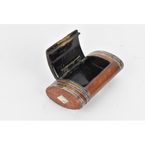 292 - A 19th century lacquer snuff box mounted with white metal fittings, the red and mottled gilt exterio... 