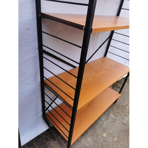 59 - Two retro vintage late 20th century Ladderax modular teak shelving units, with multiple shelves and ... 