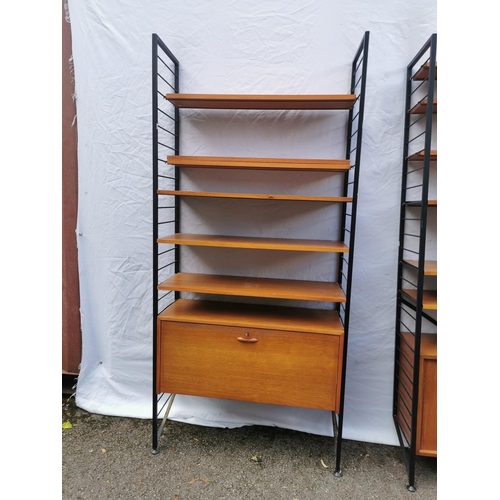 59 - Two retro vintage late 20th century Ladderax modular teak shelving units, with multiple shelves and ... 