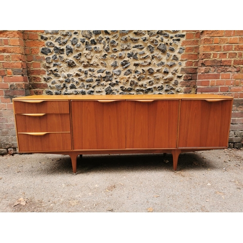 61 - A mid-20th century McIntosh teak sideboard, with two central cupboard doors flanked to one side with... 