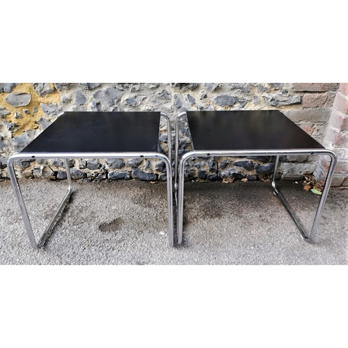 63 - A pair of Marcel Breuer for Knoll Studio laminate and chrome coffee tables, in black, together with ... 