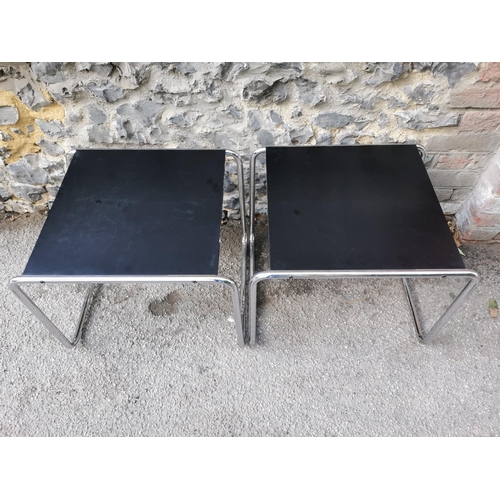 63 - A pair of Marcel Breuer for Knoll Studio laminate and chrome coffee tables, in black, together with ... 