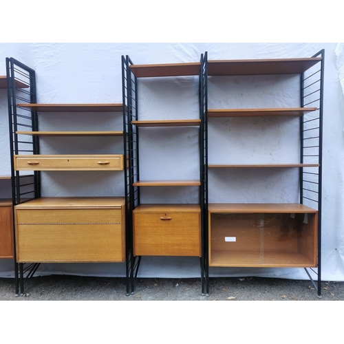 64 - Five retro vintage late 20th century Ladderax modular teak shelving units, with multiple shelves and... 