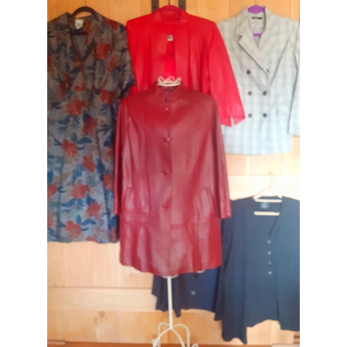 450 - A quantity of ladies clothing to include a Cypriat Massouras Leather Ltd maroon soft leather coat 44... 