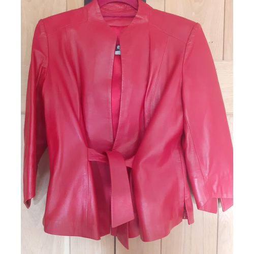 450 - A quantity of ladies clothing to include a Cypriat Massouras Leather Ltd maroon soft leather coat 44... 