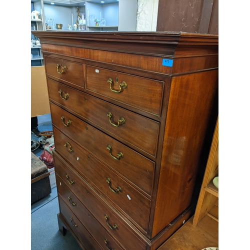 473 - An early 19th century mahogany chest on chest with two short and three graduated long drawers above ... 