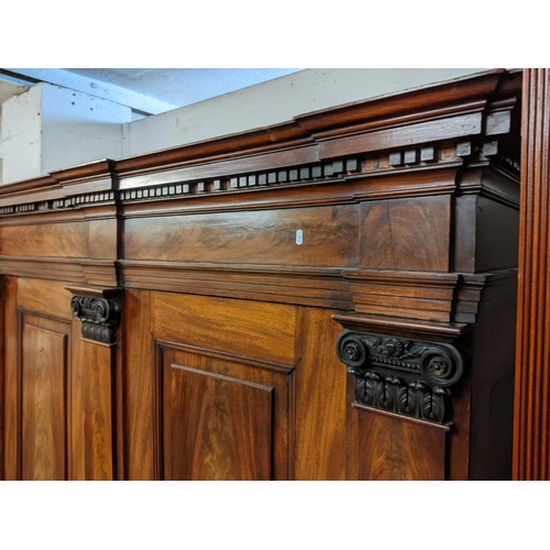 473 - An early 19th century mahogany chest on chest with two short and three graduated long drawers above ... 