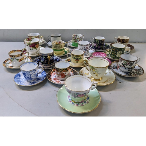 474 - A collection of coffee cans and saucers to include Royal Albert Old Country Roses, Crown Ducal, Roya... 