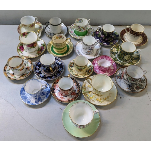 474 - A collection of coffee cans and saucers to include Royal Albert Old Country Roses, Crown Ducal, Roya... 