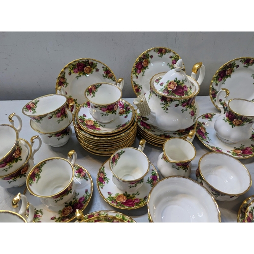 475 - A Royal Albert Old Country Roses pattern tea and coffee set comprising a teapot, cups, saucers and o... 