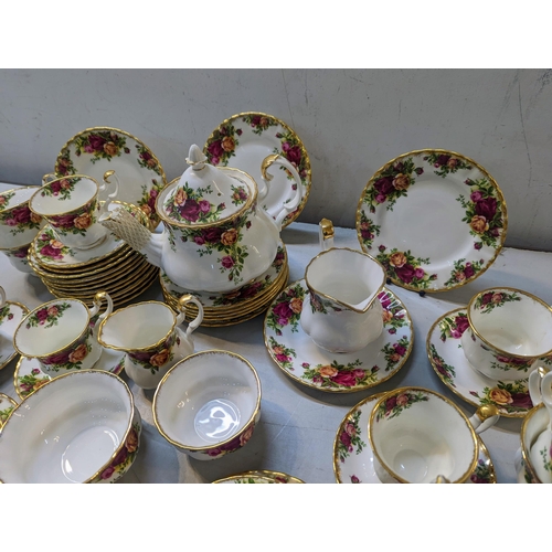 475 - A Royal Albert Old Country Roses pattern tea and coffee set comprising a teapot, cups, saucers and o... 