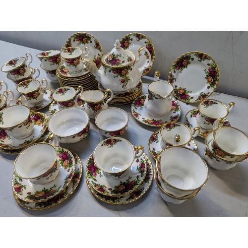 475 - A Royal Albert Old Country Roses pattern tea and coffee set comprising a teapot, cups, saucers and o... 