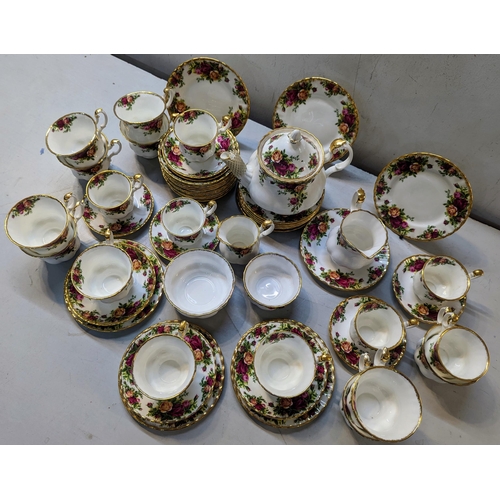 475 - A Royal Albert Old Country Roses pattern tea and coffee set comprising a teapot, cups, saucers and o... 