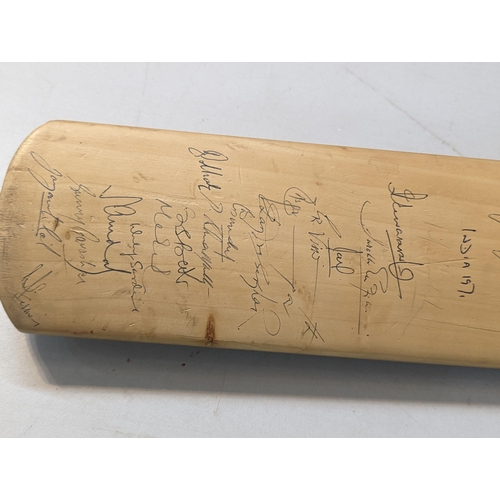 479 - A signed Slazenger cricket bat, signed by the 1971 teams of England and India to one side, and Middl... 