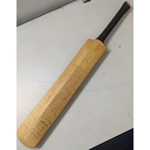 479 - A signed Slazenger cricket bat, signed by the 1971 teams of England and India to one side, and Middl... 