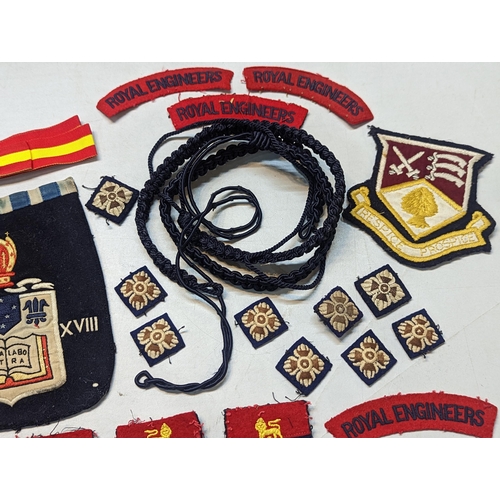 518 - Royal Engineers related cloth badges/patches to include bomb disposal, rank pips, shoulder titles an... 