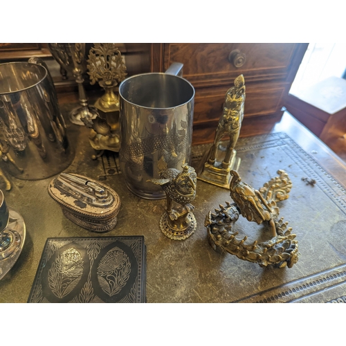 519 - A mixed lot of metalware to include Chinese pewter tankards and other examples, brass and copper Ind... 