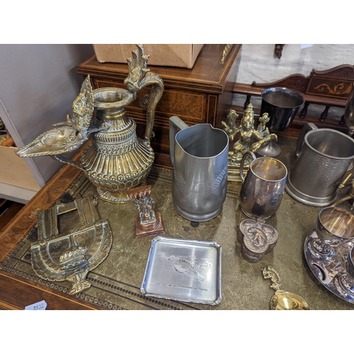 519 - A mixed lot of metalware to include Chinese pewter tankards and other examples, brass and copper Ind... 