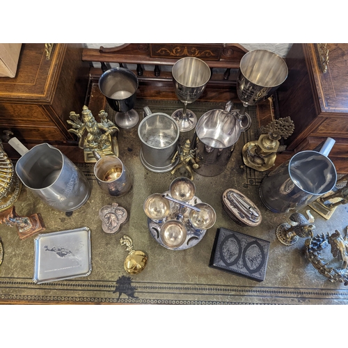 519 - A mixed lot of metalware to include Chinese pewter tankards and other examples, brass and copper Ind... 