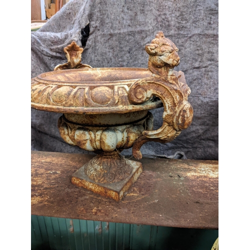 455 - A pair of late 20th century white painted cast iron garden urns, 32cm h and another with mask handle... 