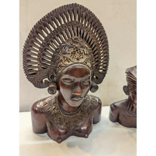 485 - A pair of wooden carved busts to include a Balinese style tribal woman and one other
Location: 11:1