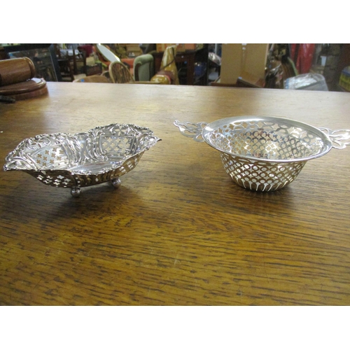 525 - Two small silver bon bon dishes to include a Deakin & Francis twin handled bowl with pierced decorat... 