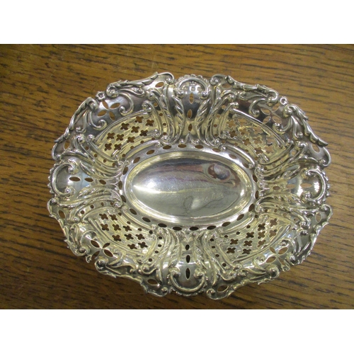 525 - Two small silver bon bon dishes to include a Deakin & Francis twin handled bowl with pierced decorat... 