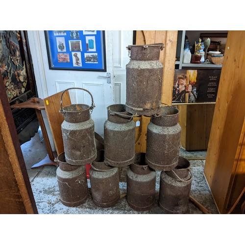 524 - Eight metal milk churns, 42cm h A/F
Location: G