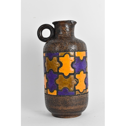 122A - A mid 20th century Bitossi pottery jug designed by Aldo Londi in the puzzle design, in orange, brown... 