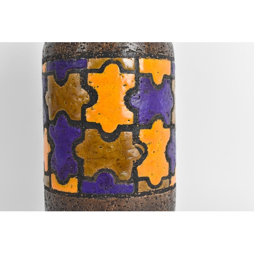 122A - A mid 20th century Bitossi pottery jug designed by Aldo Londi in the puzzle design, in orange, brown... 