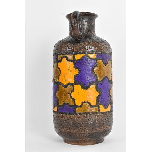 122A - A mid 20th century Bitossi pottery jug designed by Aldo Londi in the puzzle design, in orange, brown... 