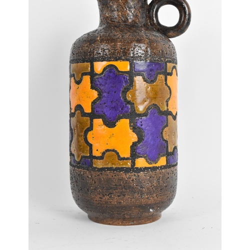 122A - A mid 20th century Bitossi pottery jug designed by Aldo Londi in the puzzle design, in orange, brown... 